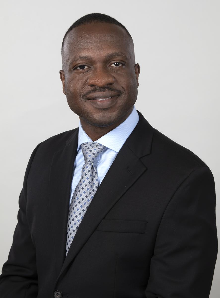 Headshot of Dr. Folayan Fatade