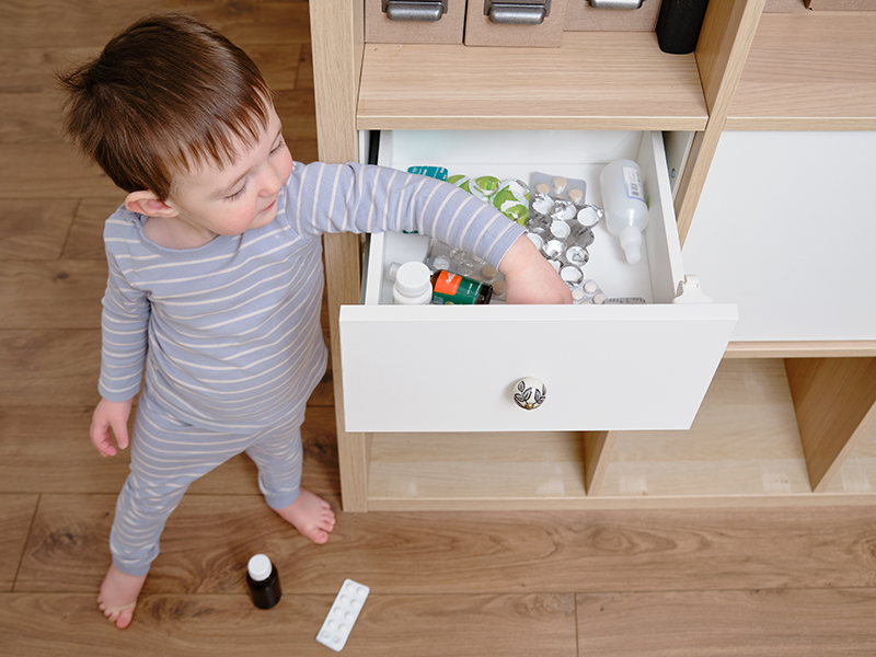 child going into drawer