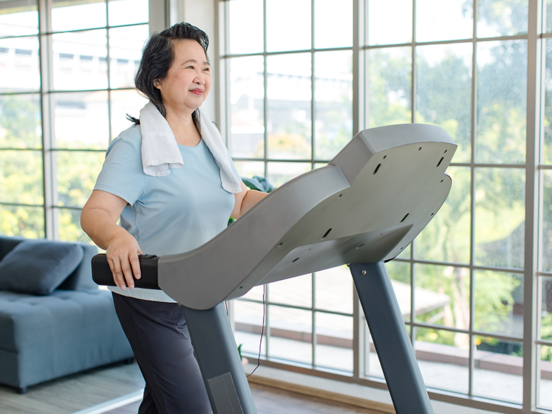 woman walking on treadmill