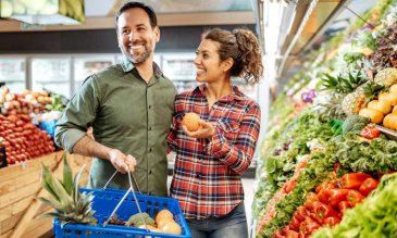 Man and woman food shopping