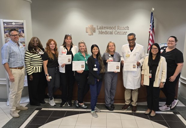 LWRMC cardiac team posing with Get With The Guidlines Cardiac Award