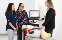 An instructor teaching students CPR